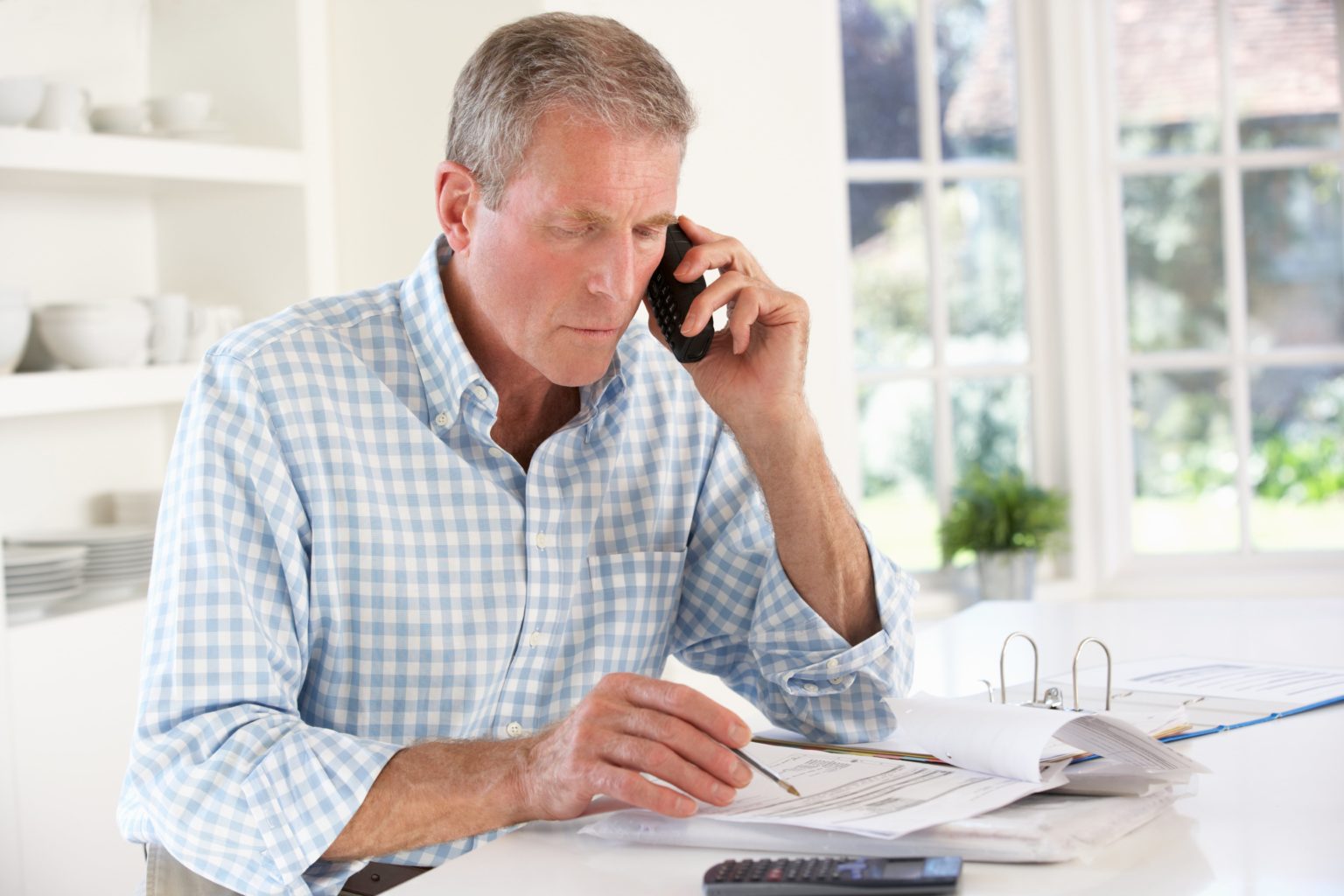 Canva-Retired-Man-with-Household-Bills-min-1536x1024 (1).jpg